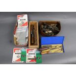 A quantity of gunsmithing reloading and gun cleaning equipment.