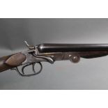 A Belgian 410 double barrelled folding shotgun, with 28" barrels, cylinder and 1/4 choke,