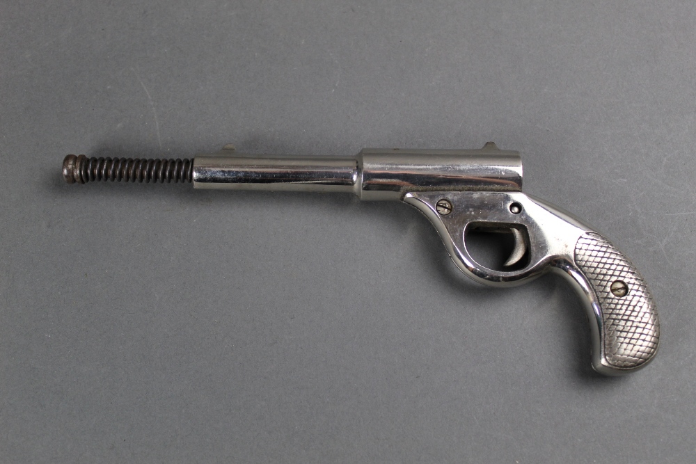 Dolla air pistol in the manner of a gat, advertised from 1890-1939, nickel plated.