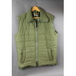 A Barbour waistcoat Size M.