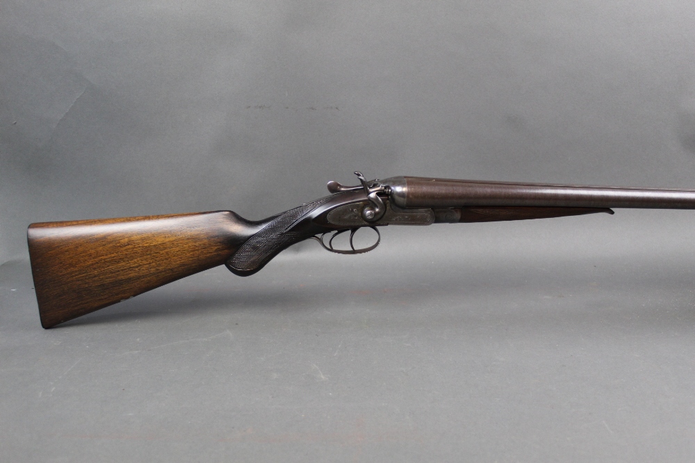 Joseph Bourne & Son, a 12 bore side by side hammer shotgun, with 30" Damascus barrels,