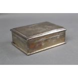 A silver cigarette box,