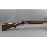 A Lincoln 10 bore over/under shotgun, with 1/2 and 1/2 choke, 89 mm chambers, top lever,