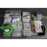 A large quantity of fly tying hooks, threads, fly boxes etc.