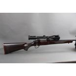 A Sako Classic rifle, cal 308 with floor plate magazine and fitted with a fine quality wooden stock,