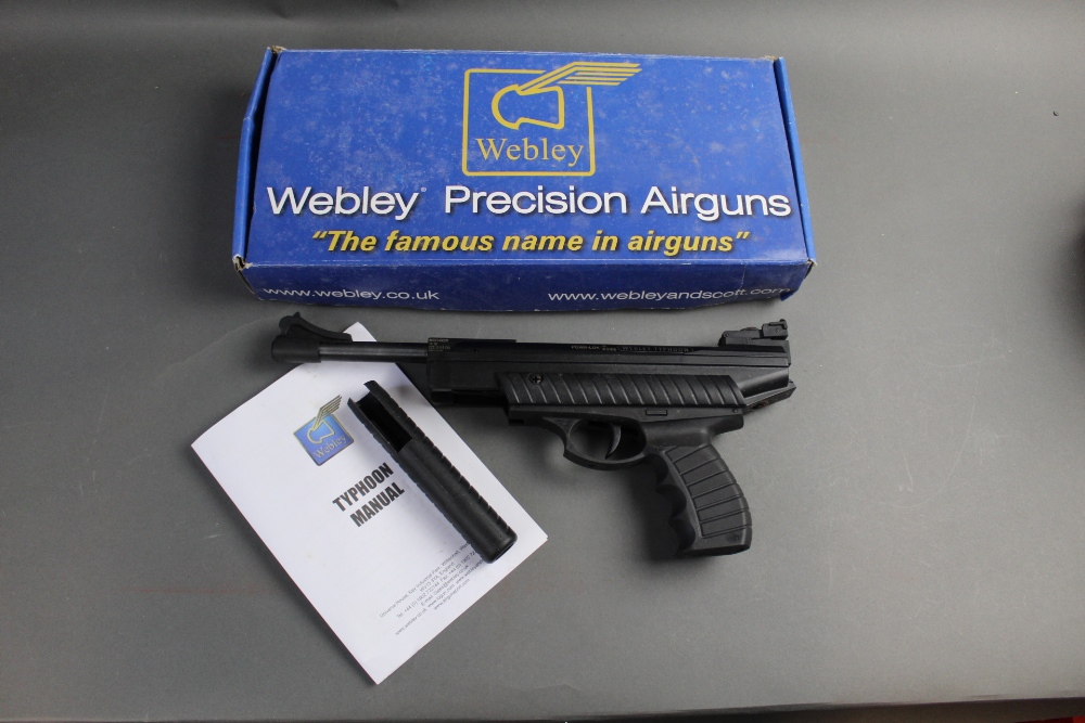 A Webley Typhoon cal 22 break barrel air pistol, with original box, cocking lever, instructions etc.