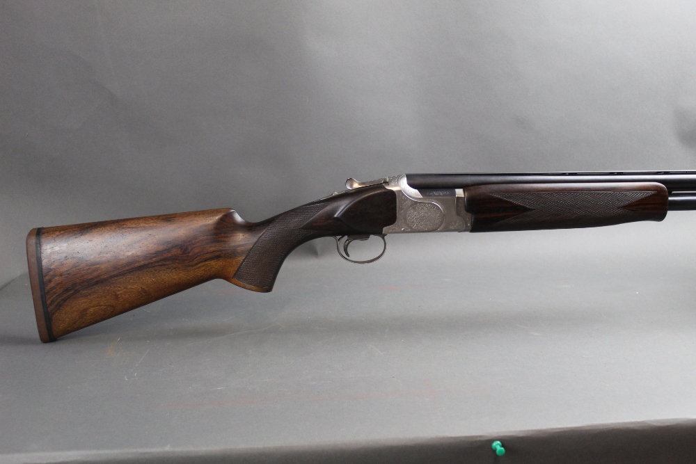 A Winchester 5500 Sporter over/under 12 bore shotgun, with 28" multichoke barrels,