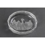 A pin dish with fox hunting scene to the base, 9 x 7.5 cm.