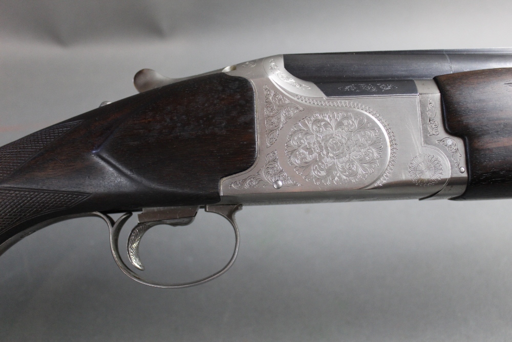 A Winchester 5500 Sporter over/under 12 bore shotgun, with 28" multichoke barrels, - Image 2 of 2