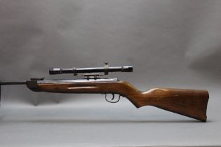 A Diana model 25 cal 177 break barrel air rifle, fitted with a Diana 3 x telescopic sight.