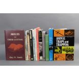 Fourteen books on trapping, shooting,