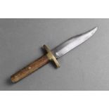 A Bowie knife, with a 5 1/2" blade, overall length 25.5 cm. SALES TO OVER 18'S ONLY.