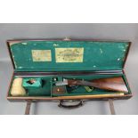 William Powell & Son, a 20 bore side by side shotgun, with 28" barrels, 3/4 and 1/4 chokes,