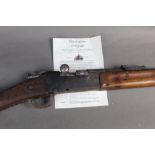 A deactivated 8 mm Lebel 1886 M93 bolt action military rifle.