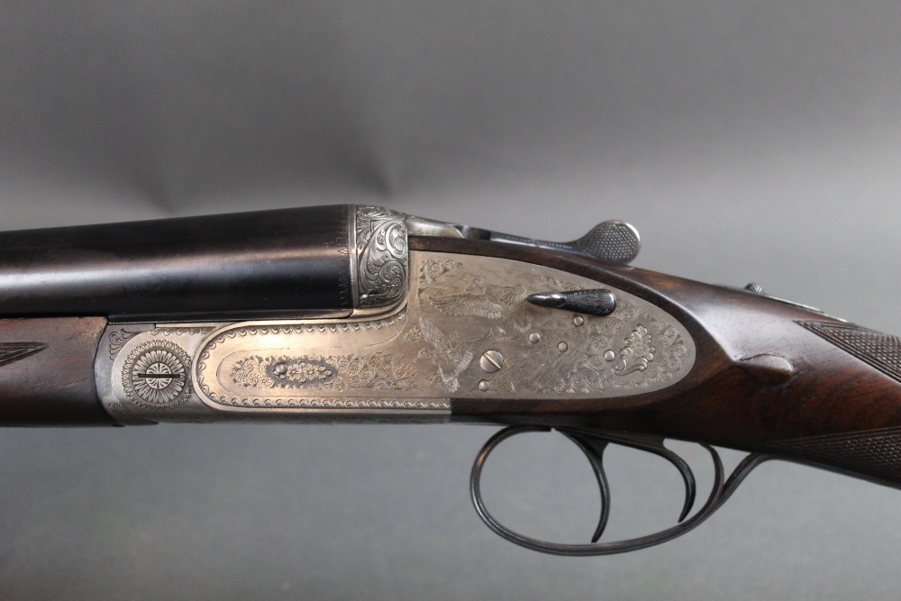 A Gunmark Royale 12 bore side by side shotgun, with 28" barrels, cylinder and 1/4 choke,