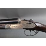 A Gunmark Royale 12 bore side by side shotgun, with 28" barrels, cylinder and 1/4 choke,