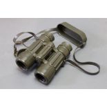 Zeiss West Germany Dialyt 8 x 30 B Safari green rubber armoured binoculars. Length 14 cm.