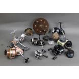 A collection of fishing reels, to include Mitchell 810, Nordic General No 65, Daiwa,