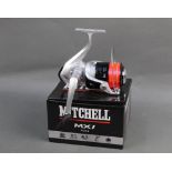 A Mitchell MX1 7000 reel with box.