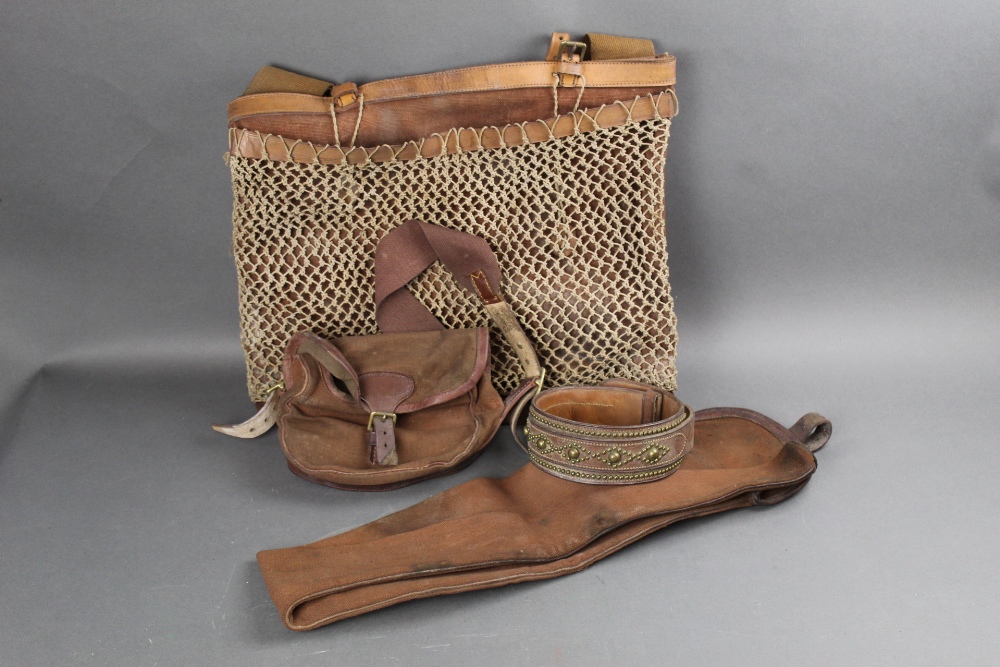 A vintage game bag, together with cartridge bag, shotgun slip and a brass studded dog collar.
