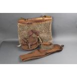 A vintage game bag, together with cartridge bag, shotgun slip and a brass studded dog collar.