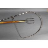 Charles Farlow London a salmon tailer, together with a Hardy eel spear with bamboo shaft,