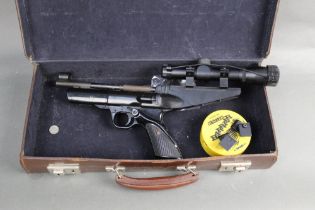A Webley & Scott Hurricane cal 22 over lever air pistol, fitted with a SMK 2 x 20 pistol scope,