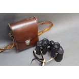 A pair of Carl Zeiss Jena Genoptem 8 x 30W binoculars, with leather case. Serial No. 4144353.