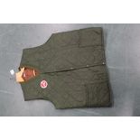 An Aros quilted waistcoat with Wagbi badge Size XL,