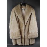 Taxidermy - A Martial & Snelgrove of Manchester blond mink fur coat. Approximate Size 12.