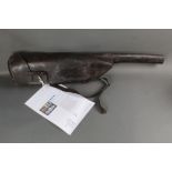 A leather leg of mutton gun case with leather label "Captain Wilbraham Taylor, Cockswell Lodge,