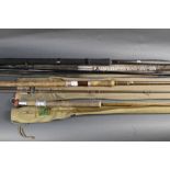 Two spinning rods, a Shakespeare O-Series Graphite Glass rod, in two sections 3.