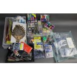 A large quantity of fly tying materials, to include Mashama fly tying hooks,