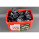 A box containing a quantity of clay pigeons, minis, standards etc.