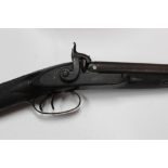 An English 20 bore percussion side by side sporting gun,