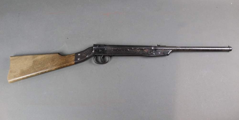 A Diana Model 15 cal 177 air gun, having a smooth bore barrel. Overall length 32 1/4".