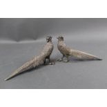 A pair of early 20th century silver plated pheasant ornaments. Height 8 cm, length 18 cm.