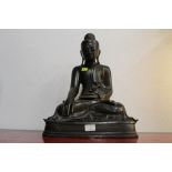 Large bronze Buddha, height 44 cm, width 36 cm.