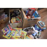 Two boxes of jigsaw puzzles, children's magazines, to include Enid Blyton,