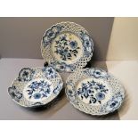 Two blue and white reticulated plates and bowl marked with blue crossed swords to reverse