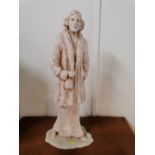 Figural sculpture of a lady,