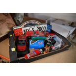 Box of mixed large scale diecast model cars and signs