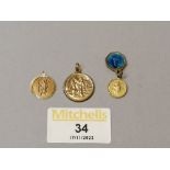 Three 9 ct gold St Christopher medals and enamelled Madonna, gross weight 4.