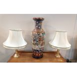 Pair of decorative table lamps with shades and brass columns,