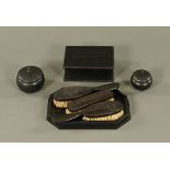 An ebony box, together with a dressing table set.
