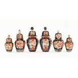 A group of Japanese late Meiji period jars and covers. Largest height 24 cm, smallest 18 cm (6).