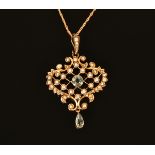 A 9 ct gold Victorian aquamarine and seed pearl pendant and chain. Weight 8.4 grams.