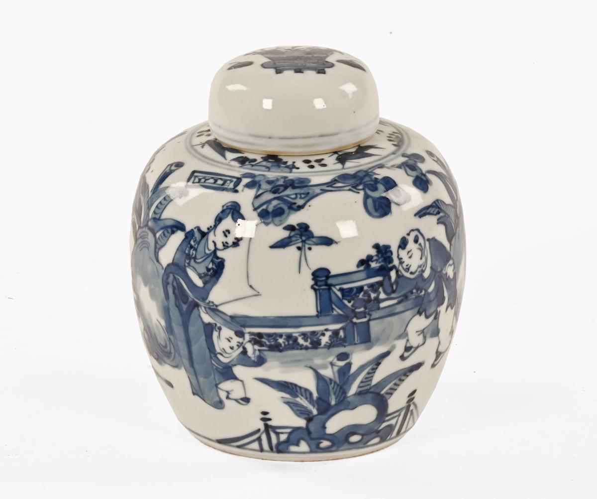 A Chinese blue and white double ring ginger jar, of ovoid form with painted figures in a garden.