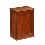 A Victorian mahogany small cabinet, with moulded edge and single door opening to a shelf.