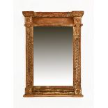 An 18th century giltwood and gesso tabernacle frame with mirror plate. Height 46 cm, width 24 cm.